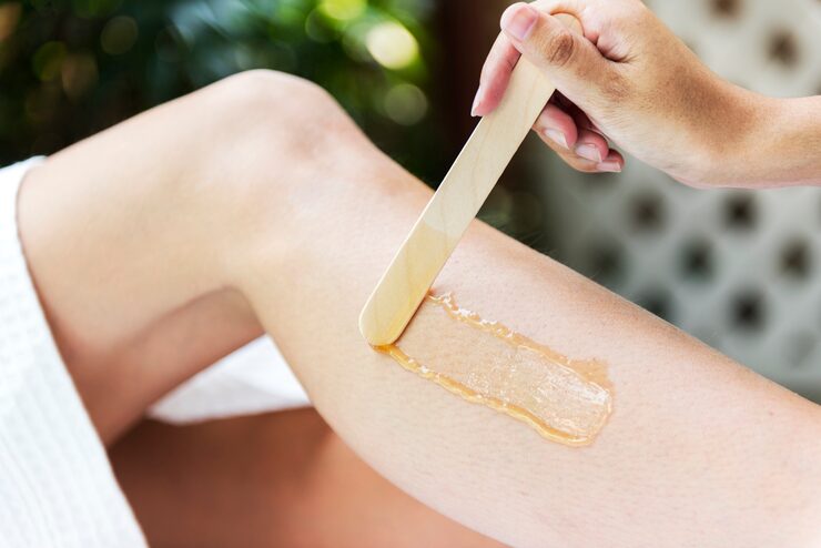 woman getting legs waxed spa 53876 13496 woman getting legs waxed spa 53876 13496