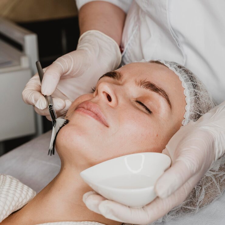 young beautiful woman getting face skin treatment 23 2148825378 young beautiful woman getting face skin treatment 23 2148825378